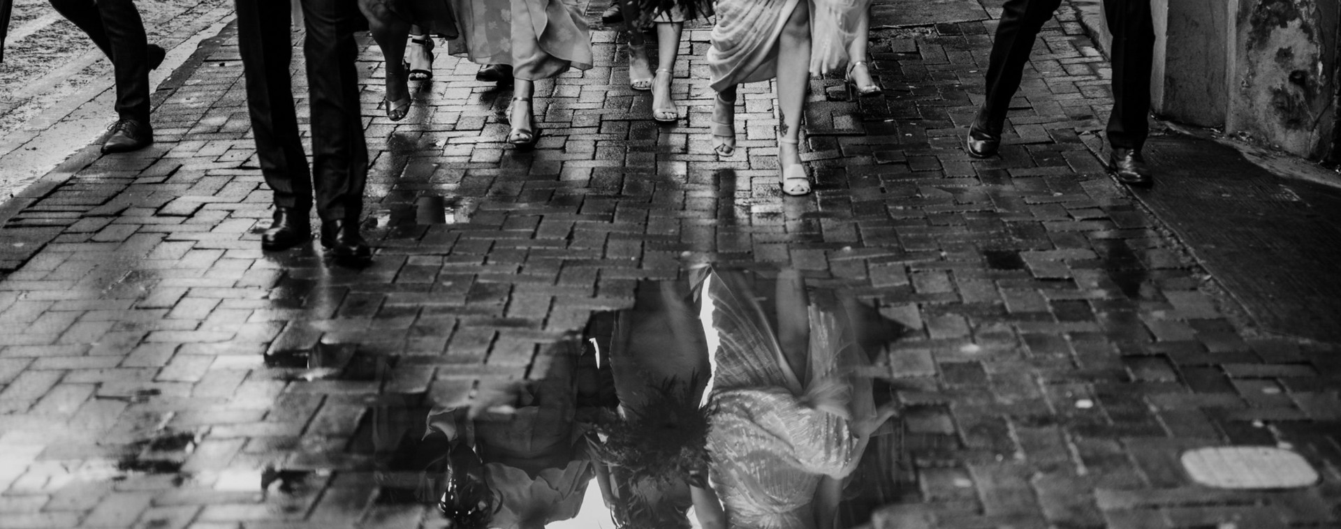 Wedding Photography - Refective photo in puddle
