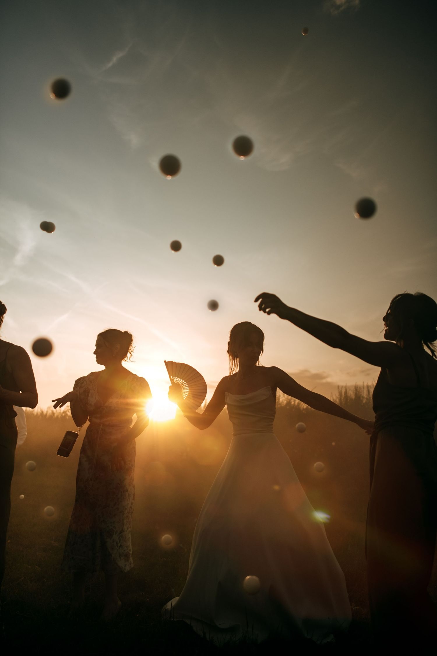 Wedding guests celebrating outdoors at Lincolnshire wedding venue