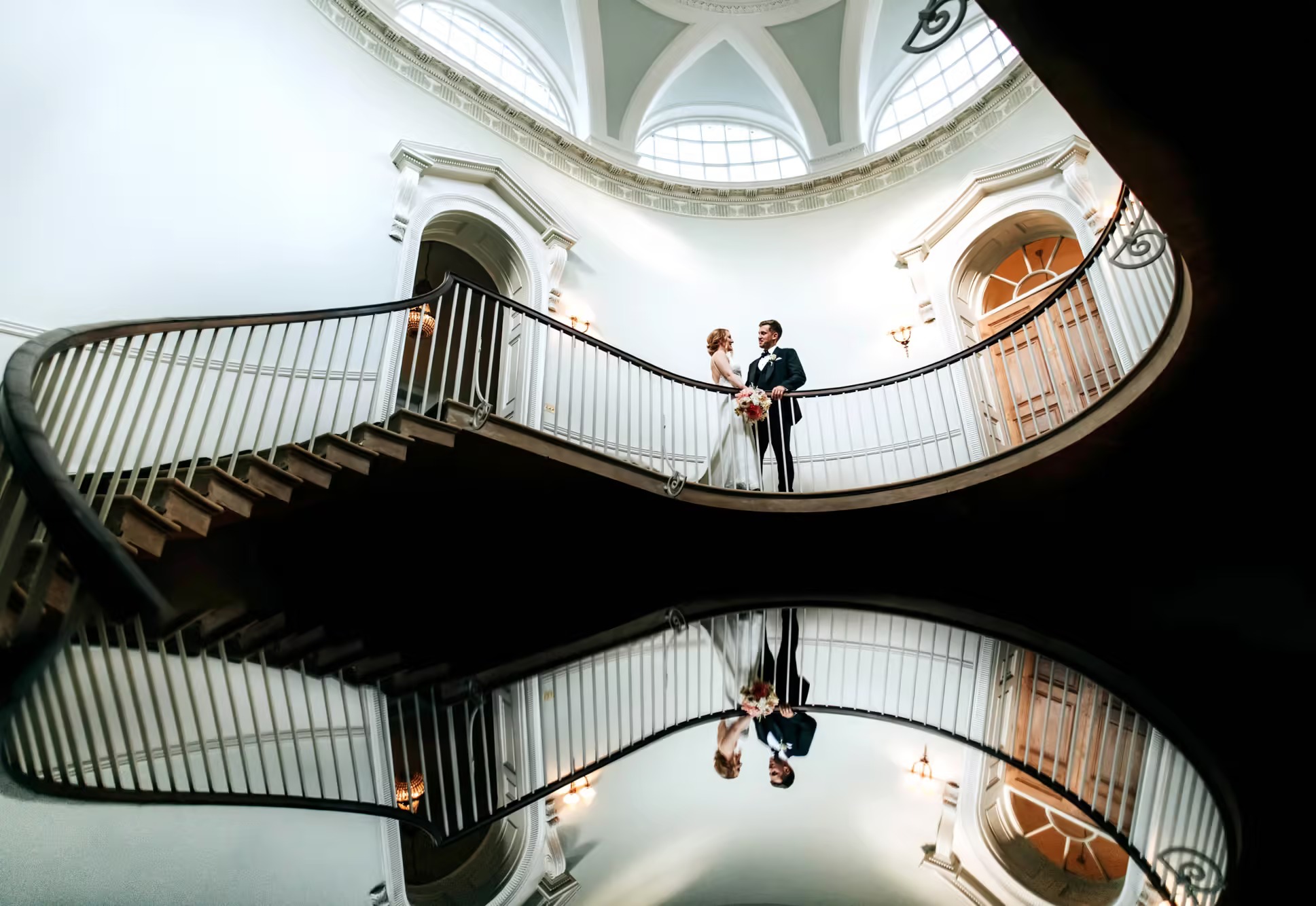 Bride & Groom Stairway Photograph at a Middleton Lodge Wedding