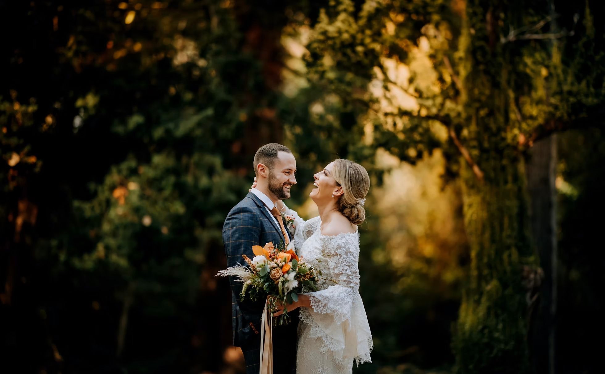 Bride and groom portrait in gardens at Hirst Priory wedding venue