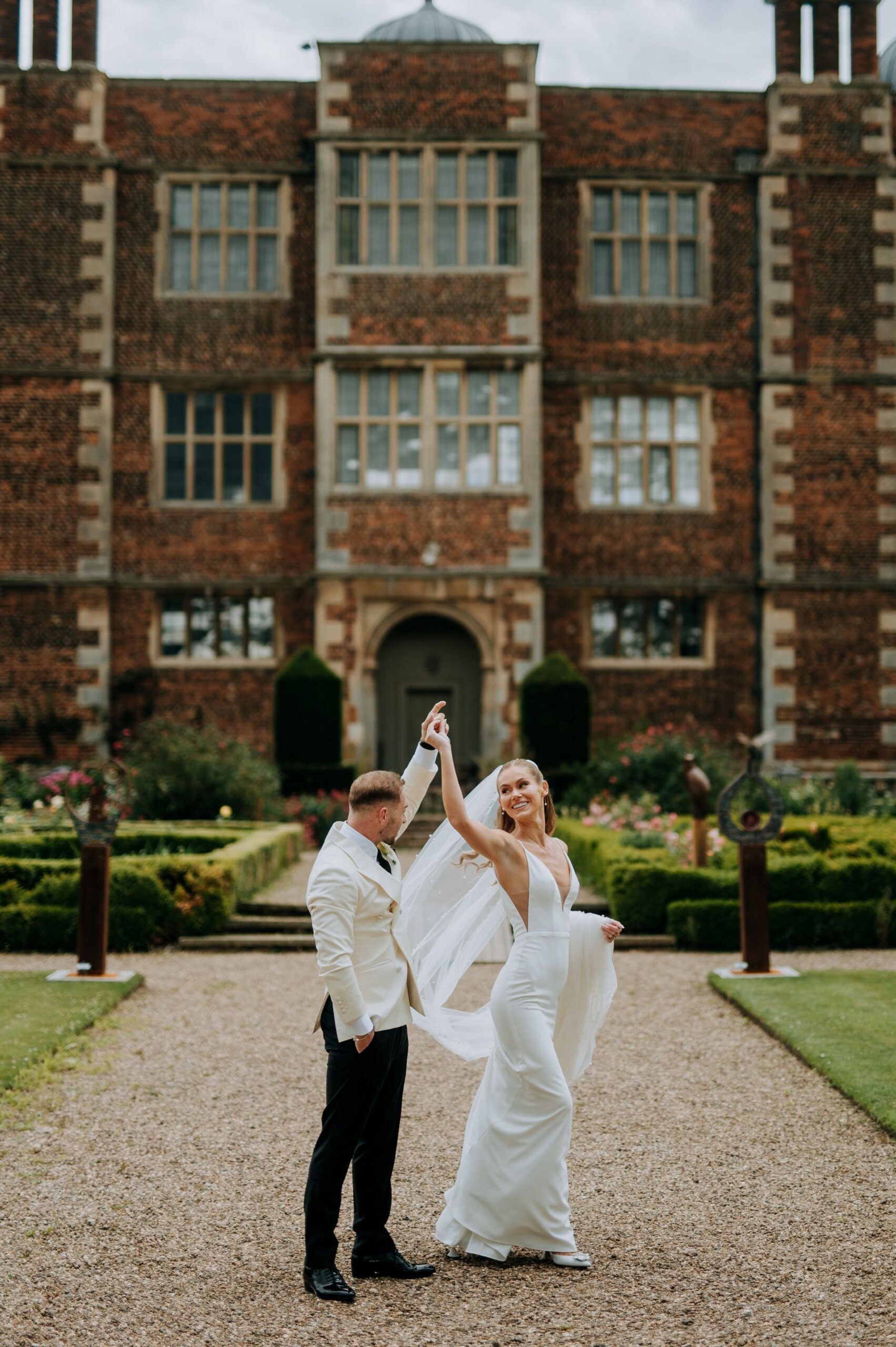 Doddington Hall Wedding Photograph of the happy couple outside doddington hall