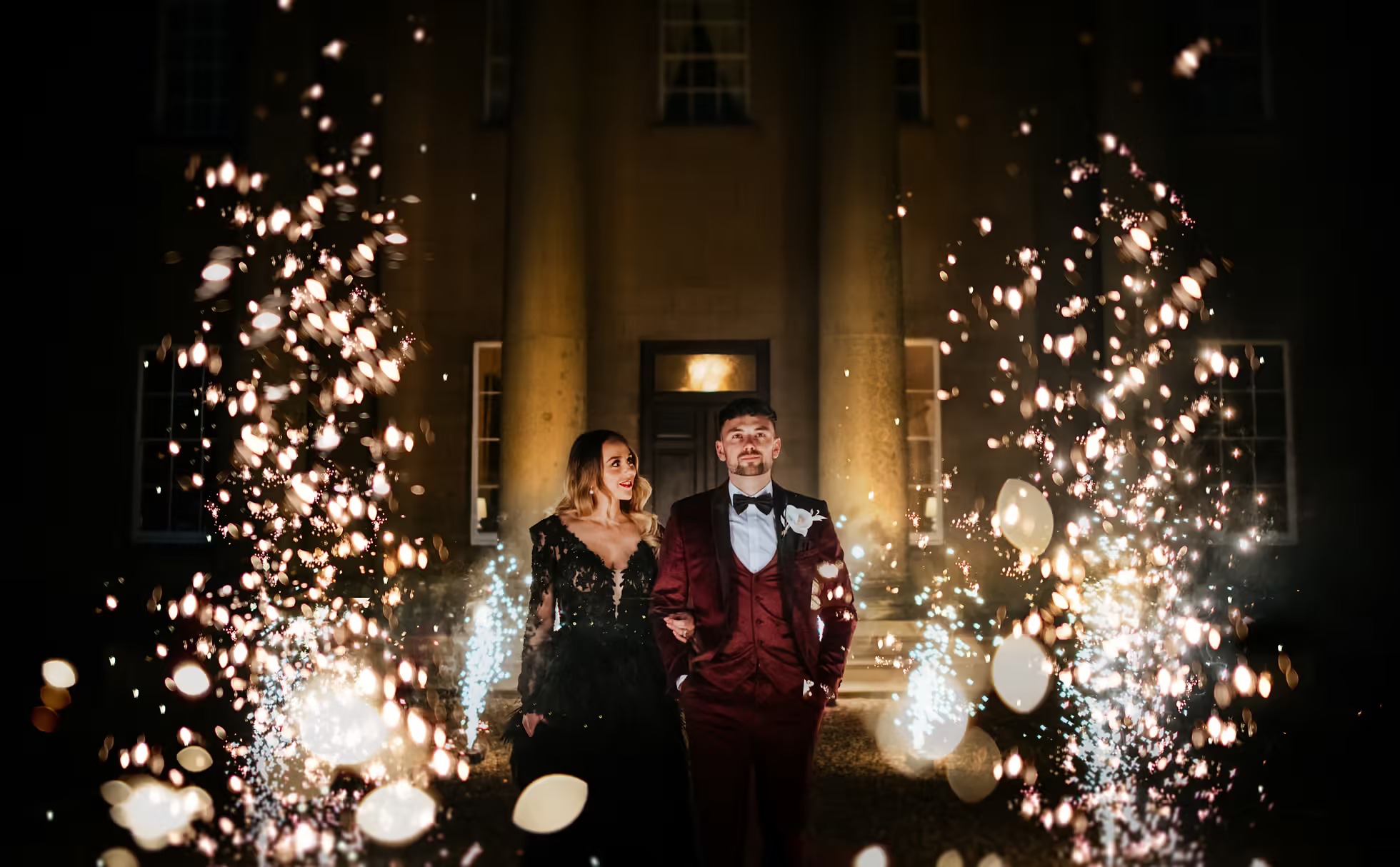 Evening sparkler entrance at Rise Hall wedding reception