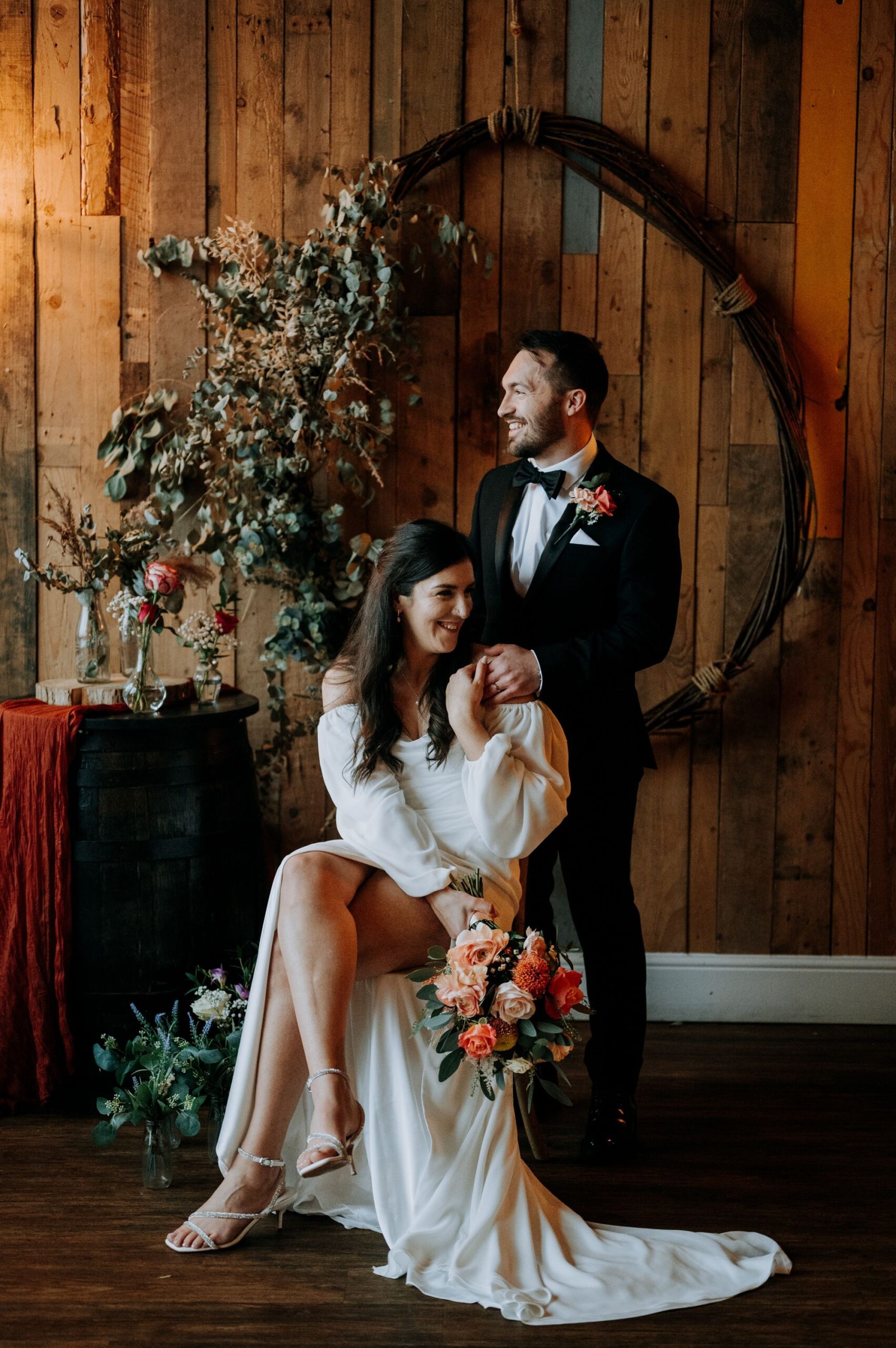 Bride and groom portrait inside Little Wold Vineyard wedding venue
