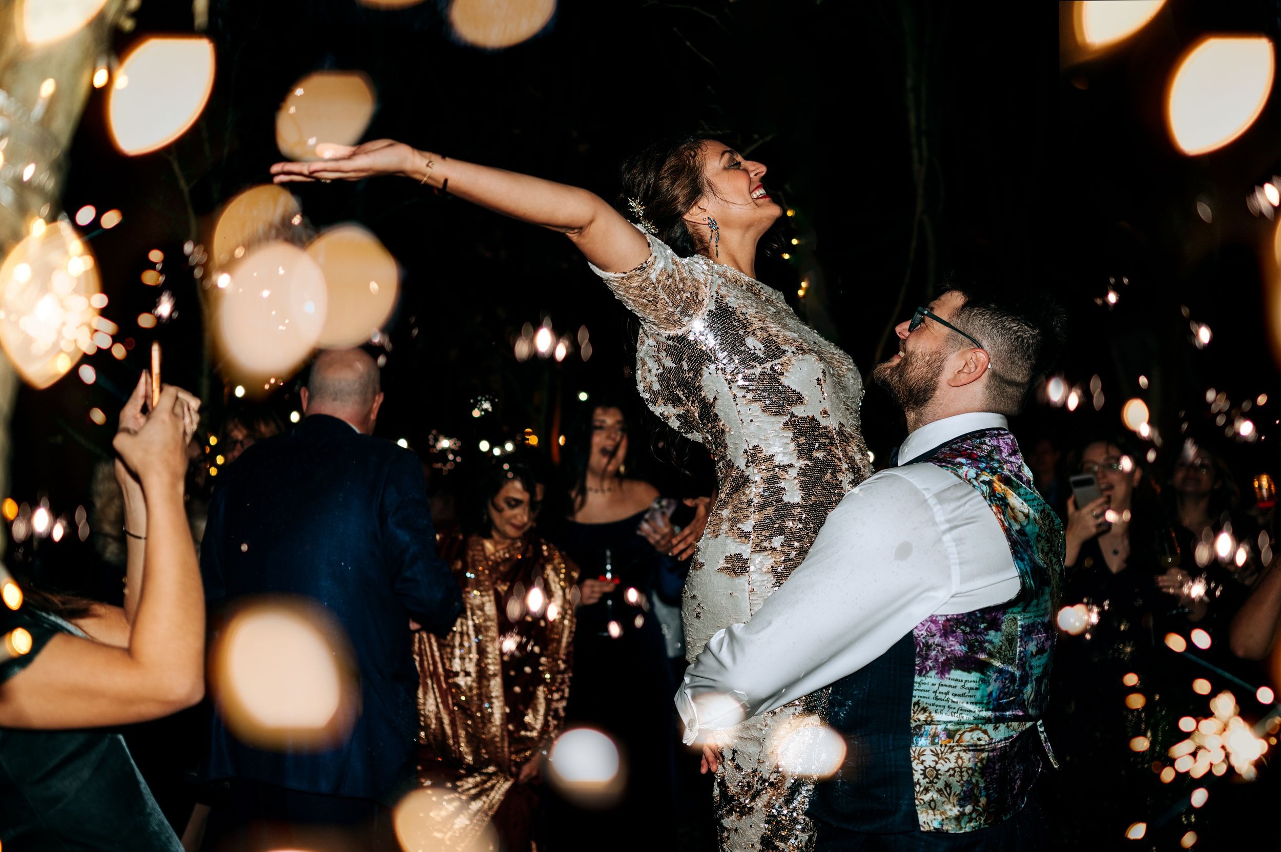 Guests celebrating on dancefloor at Oaklands wedding reception