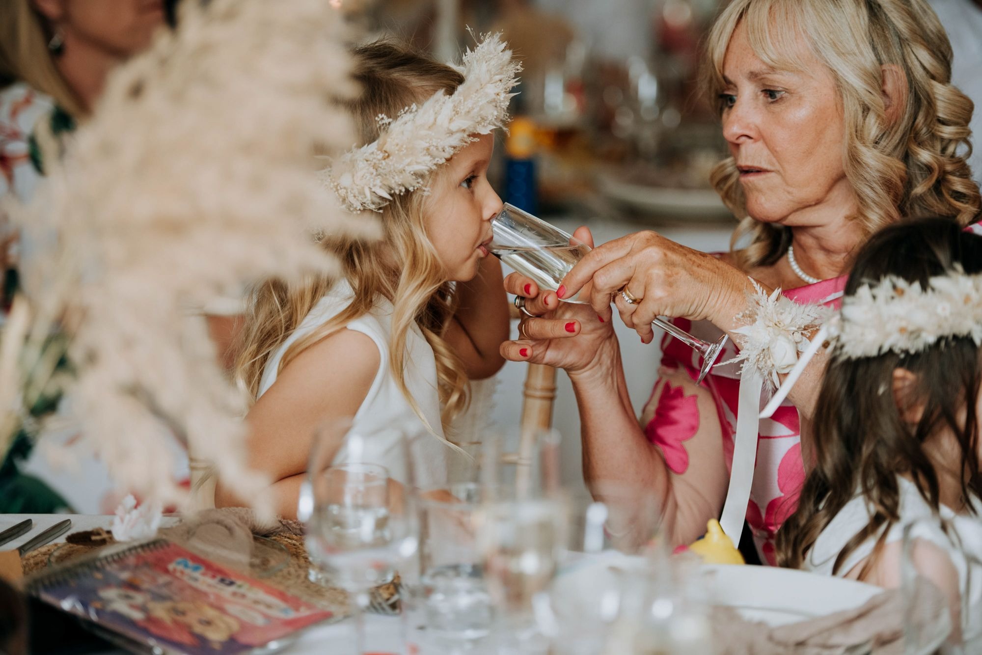 Mother of the Bride and guests during wedding breakfast at Hirst Priory