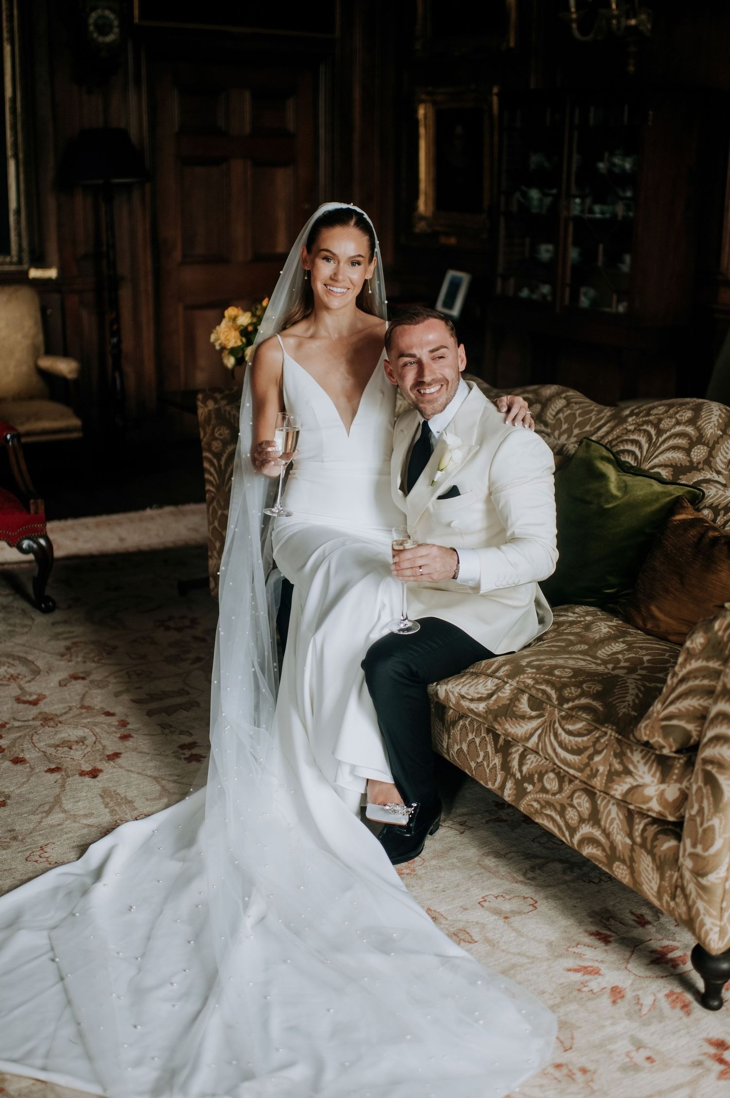 Bride and groom seated during wedding reception in Lincolnshire