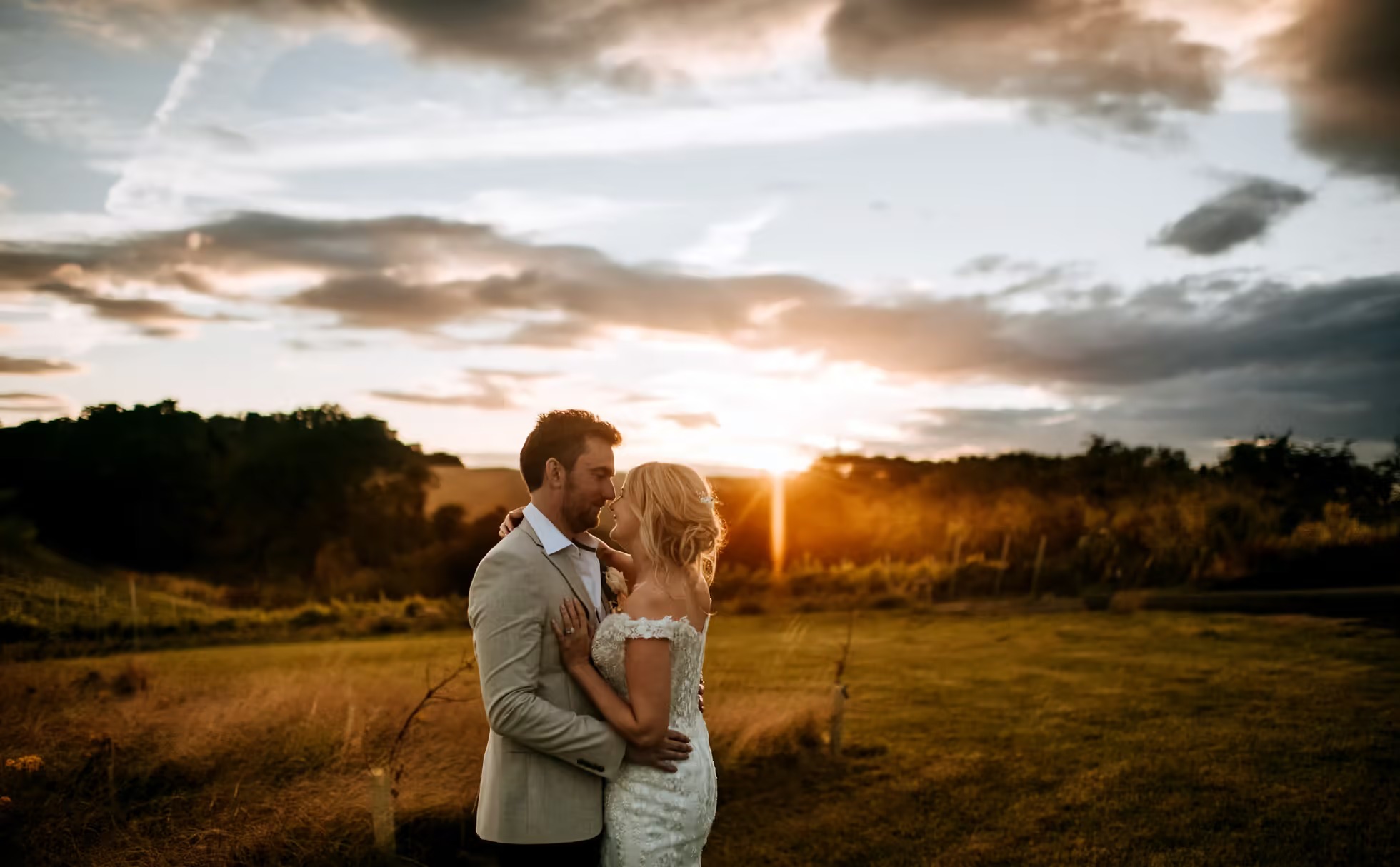 Golden hour wedding portrait at Little Wold Vineyard