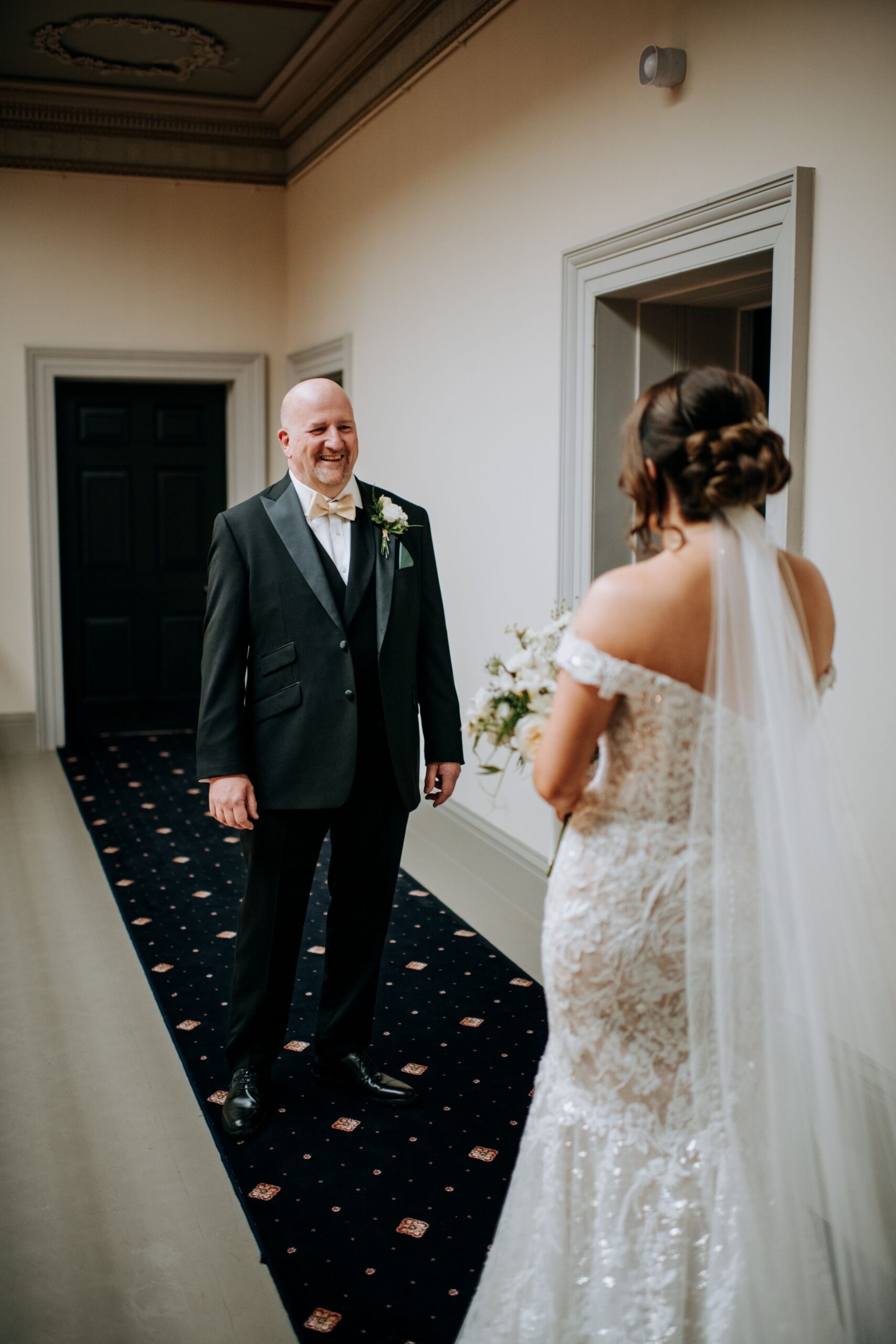 Emotional first look moment at Rise Hall wedding venue