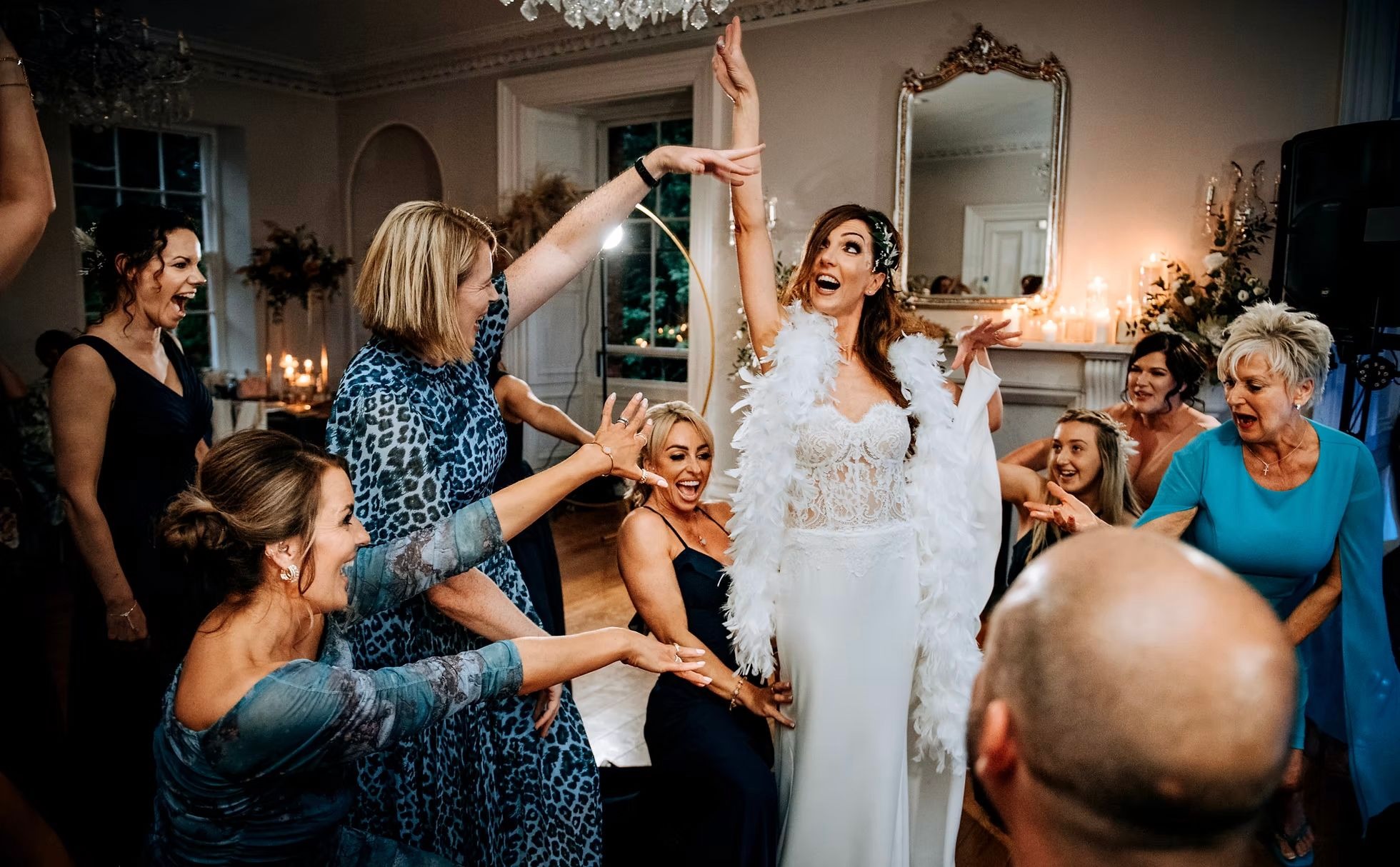 Bride celebrating on dancefloor at Hirst Priory wedding reception