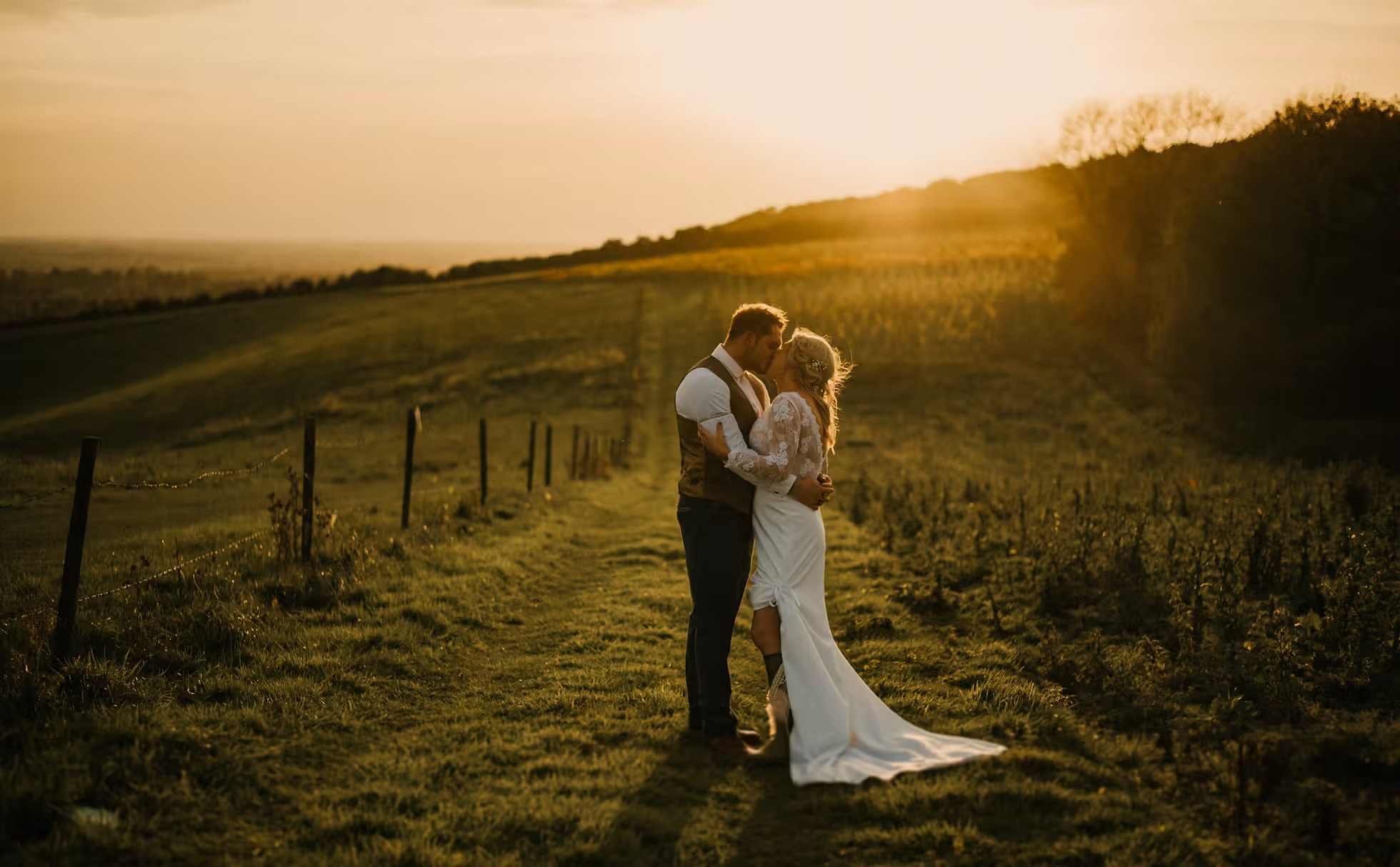 Sunset bride and groom portrait in Little Wold Vineyard countryside