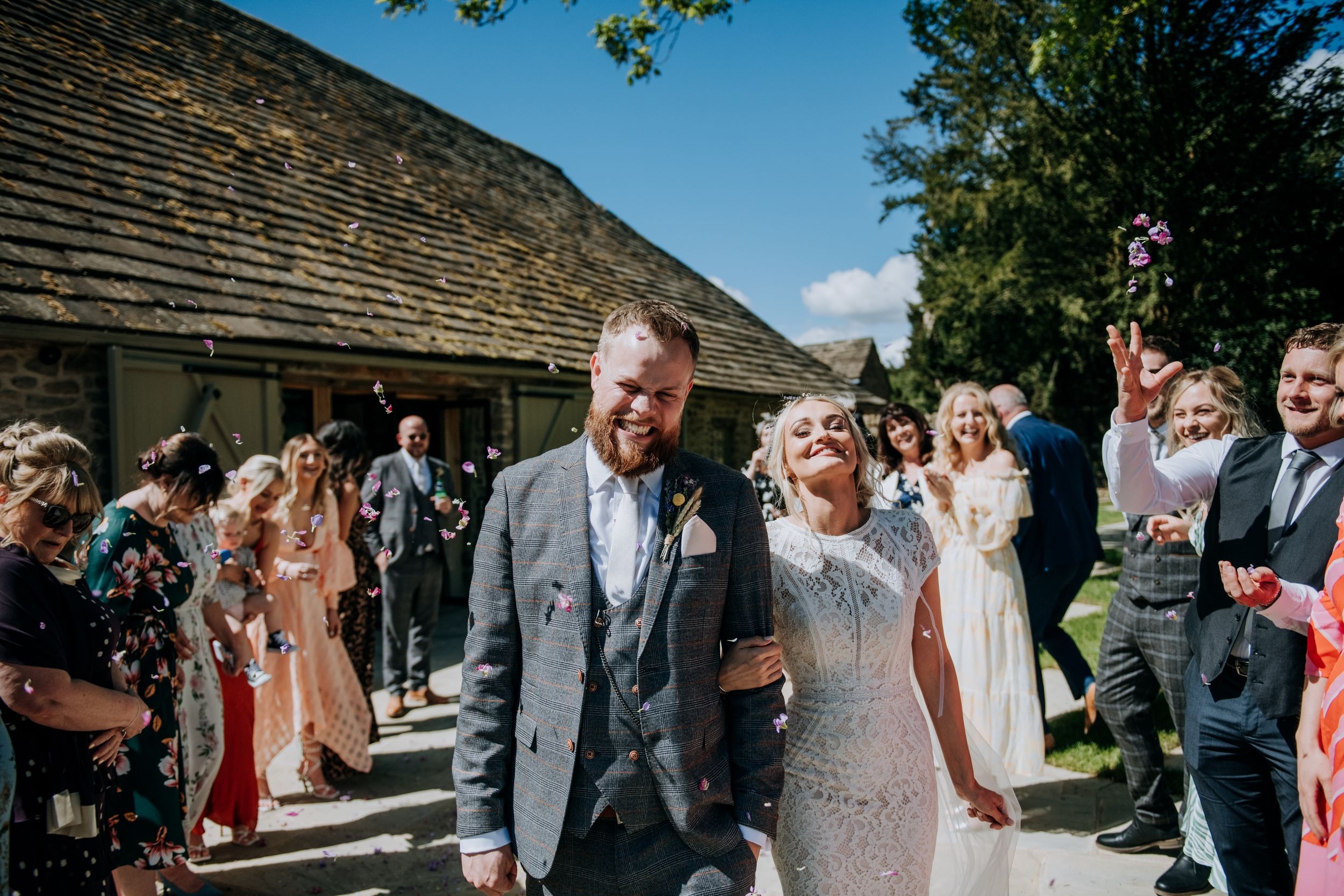 Confetti Photograph of Bride & Groom at Tithe Barn Wedding