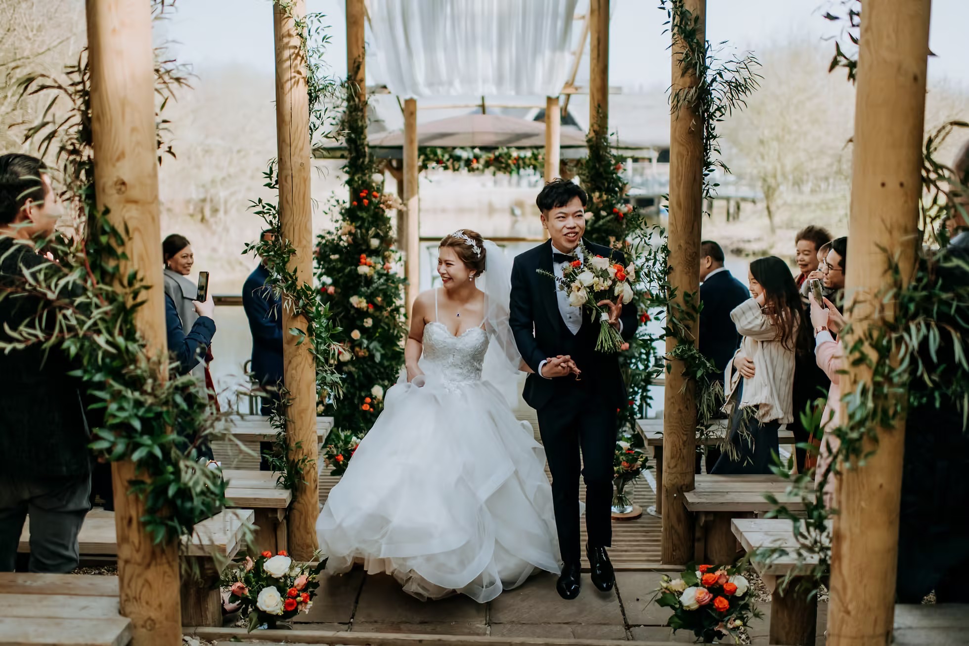 Bride entering wedding ceremony at Oaklands wedding venue