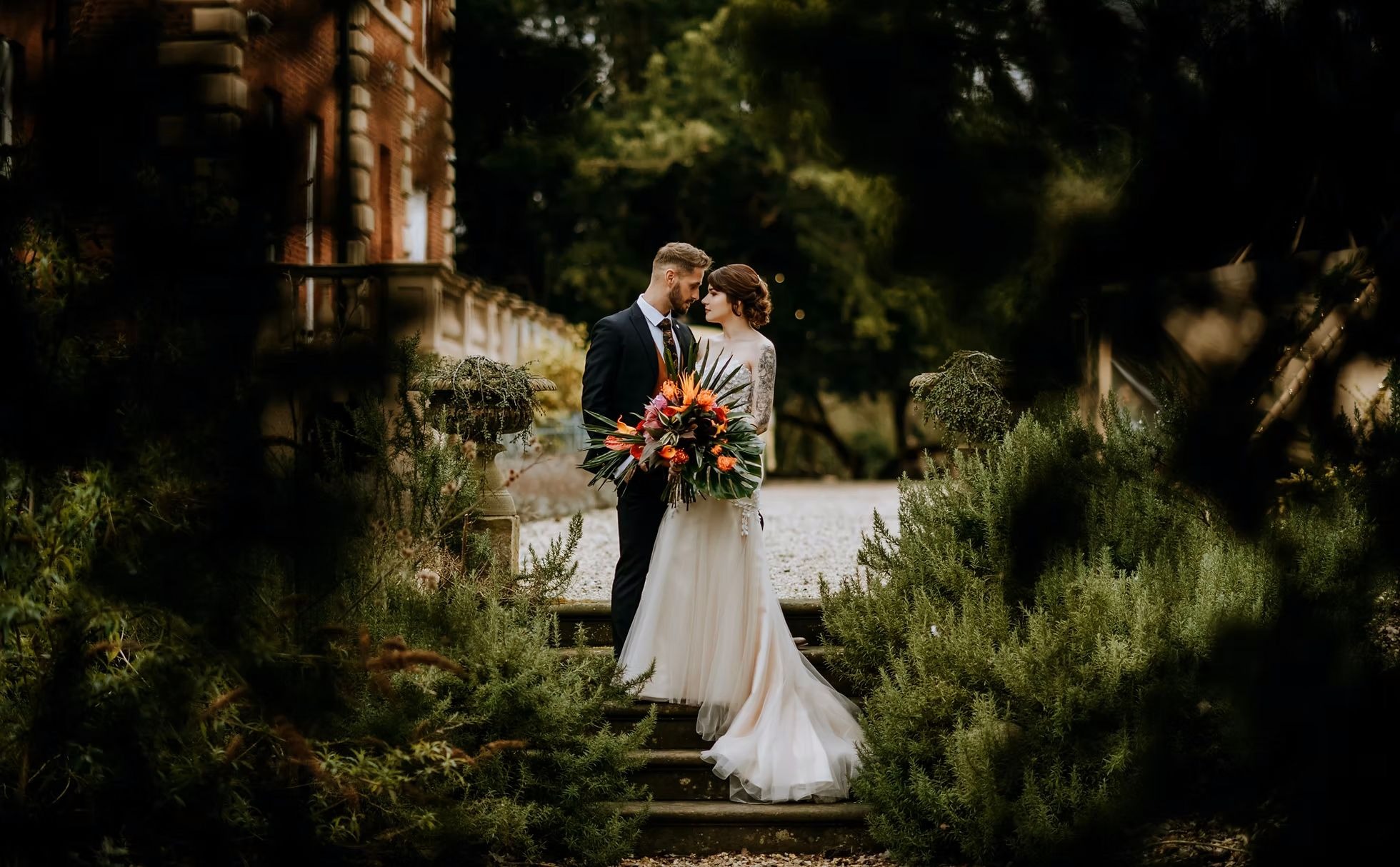 Bride and groom portrait in woodland at Hirst Priory