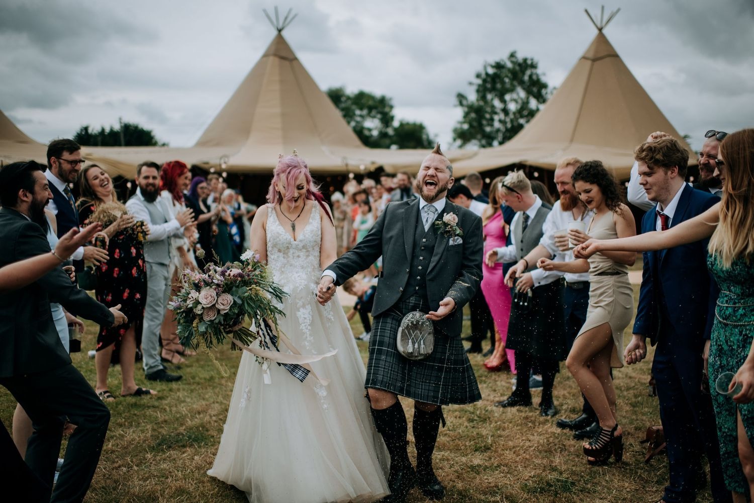 Guests celebrating confetti moment at Lincolnshire wedding
