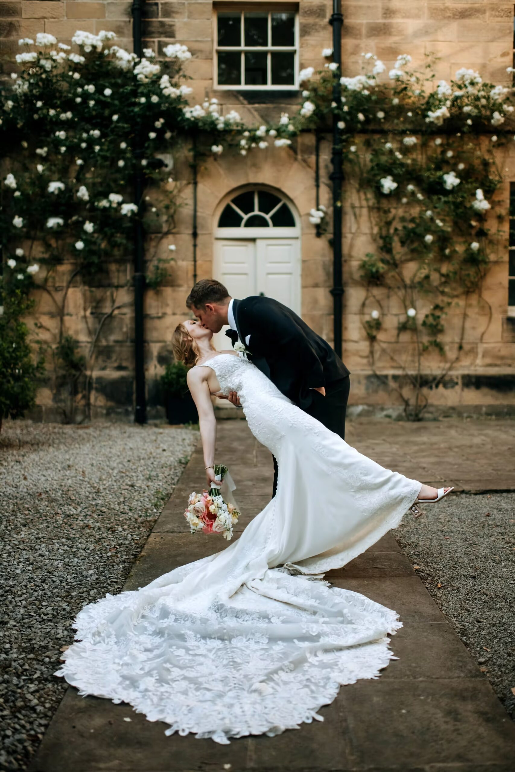 Posing Bride & Groom Kissing at Middleton Lodge Wedding