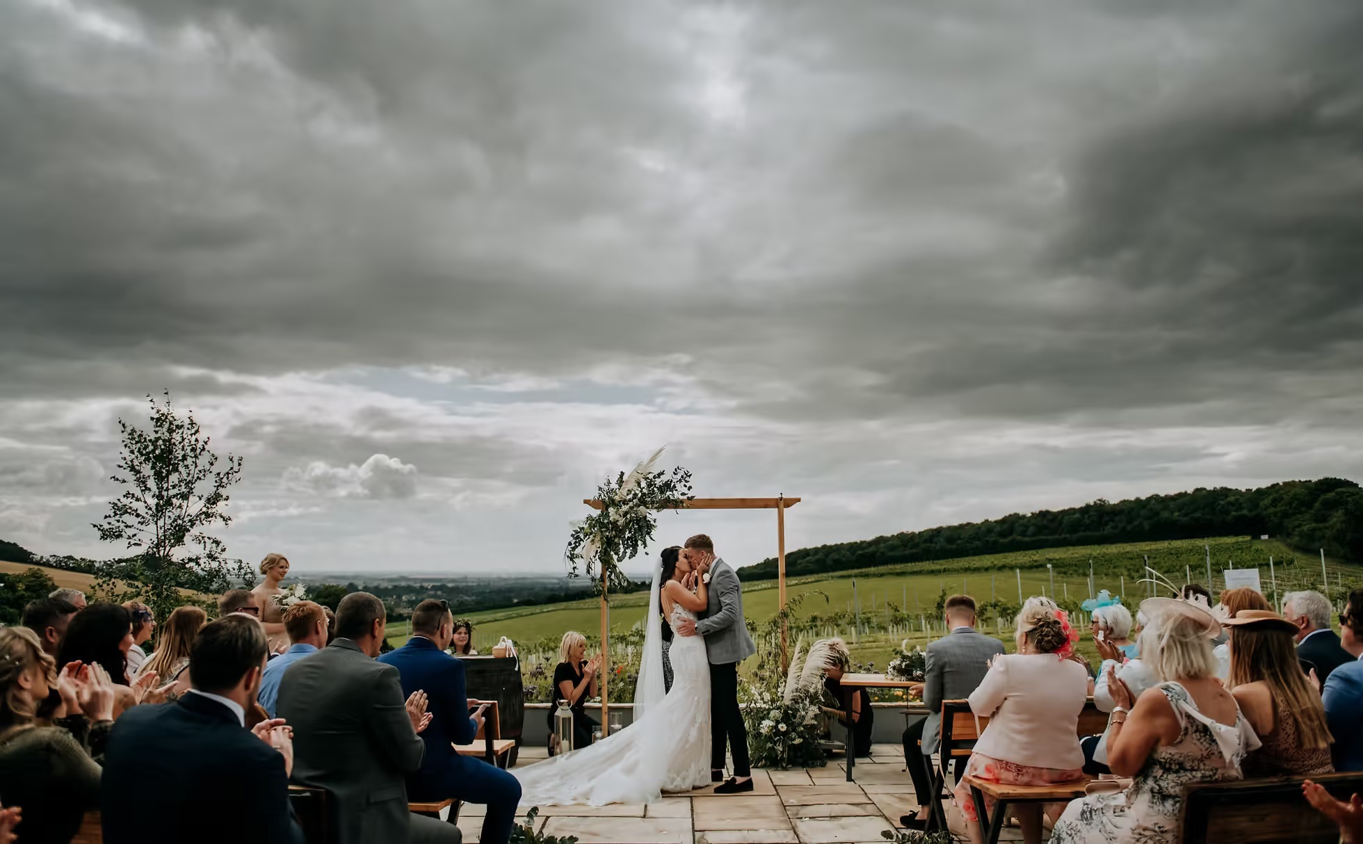 Outdoor wedding ceremony at Little Wold Vineyard wedding venue