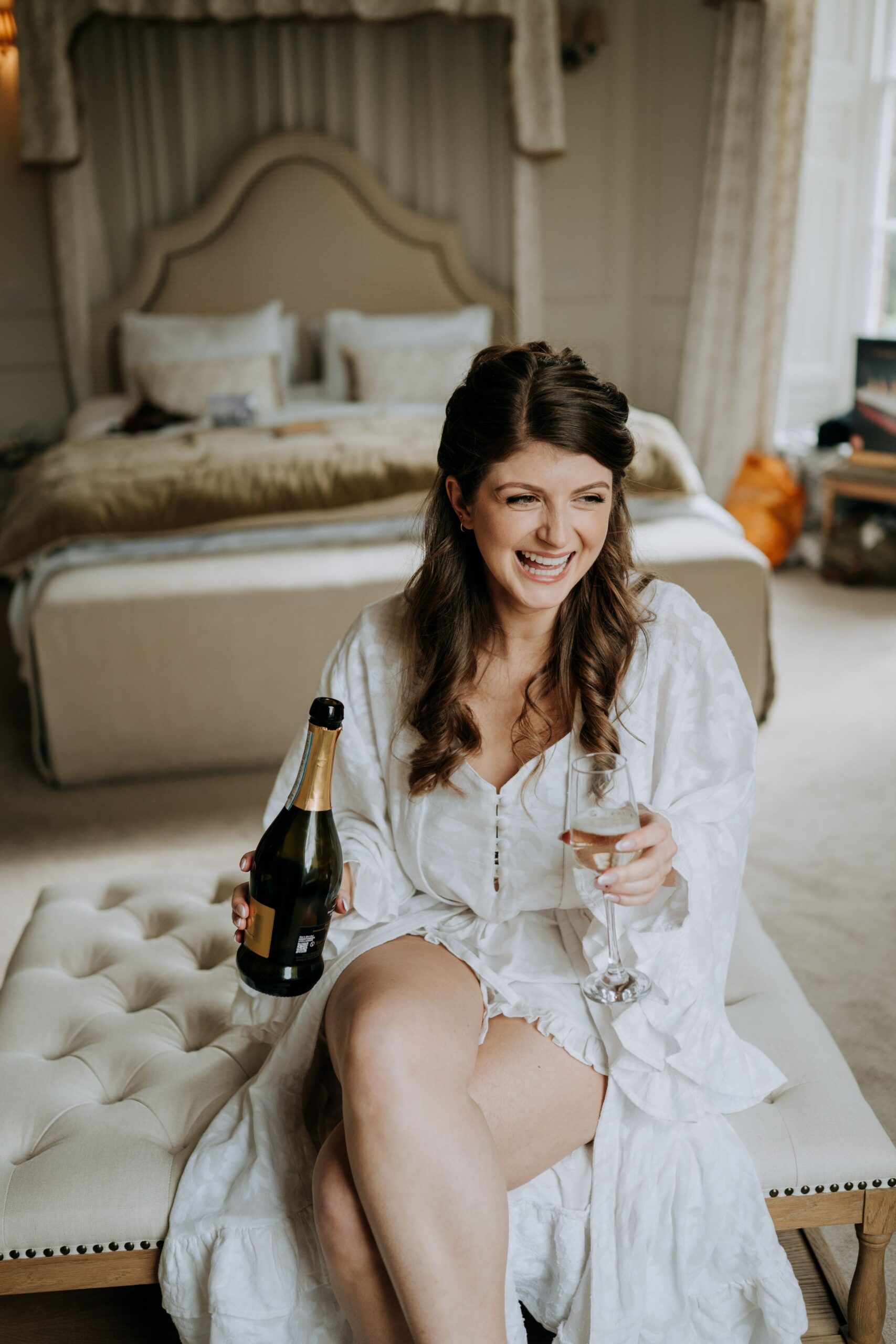 Bride relaxing during wedding morning at Wootton Hall