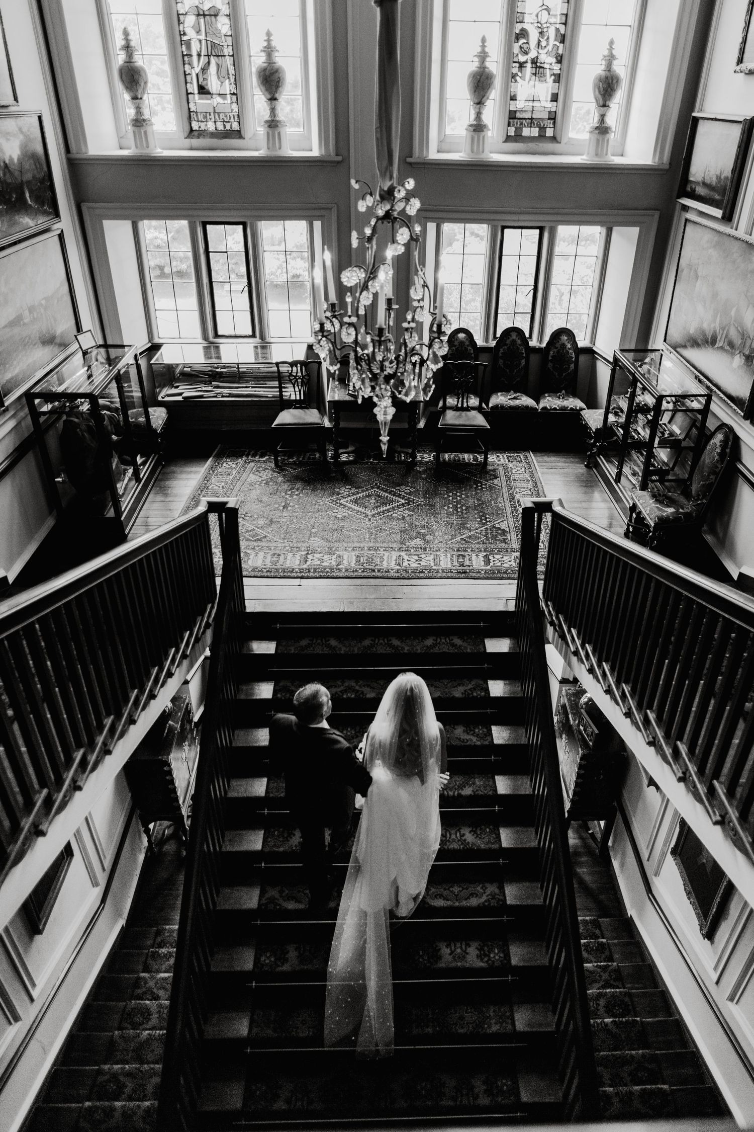 Black and white staircase portrait at Lincolnshire wedding venue