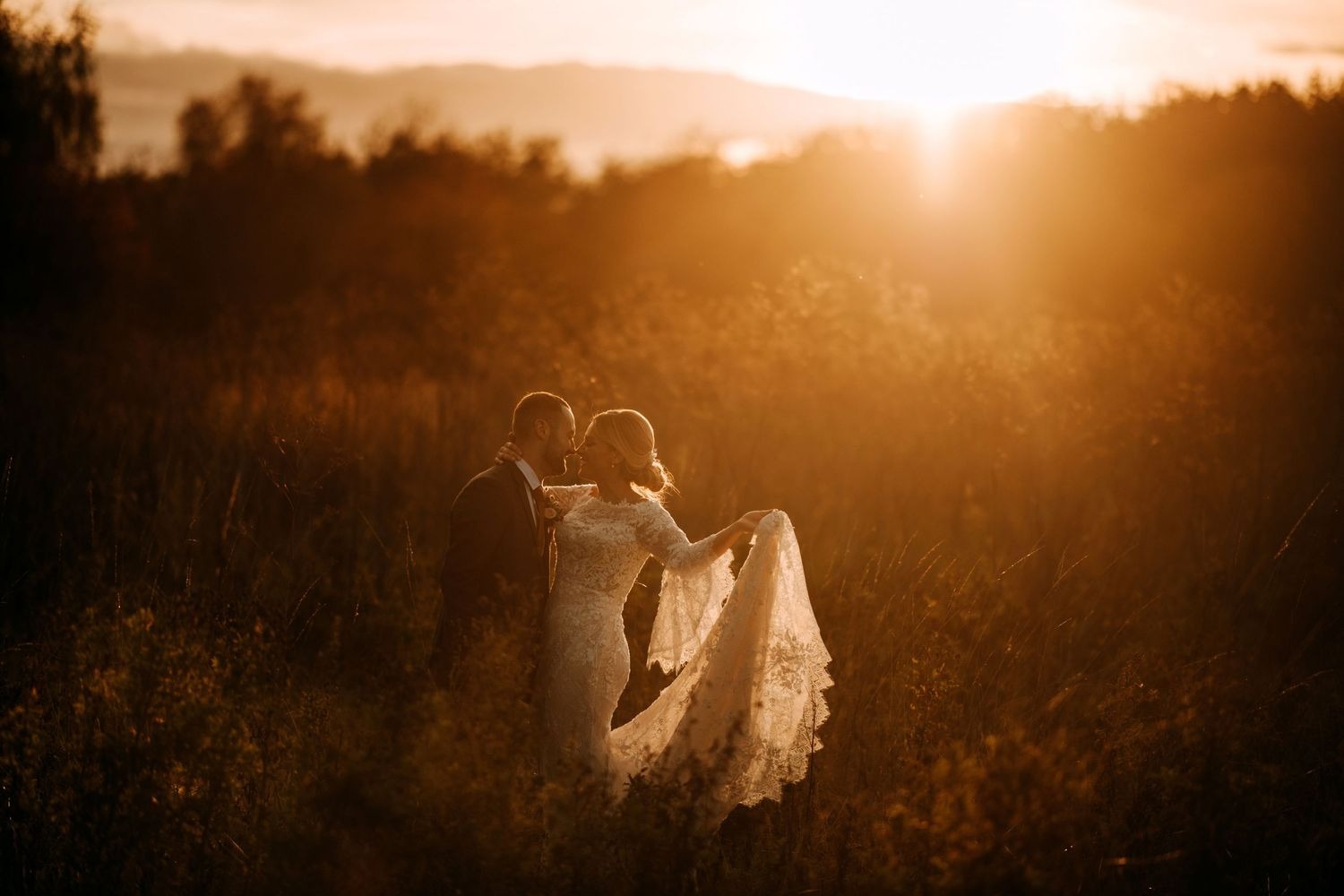 Sunset bride and groom portrait in Lincolnshire fields