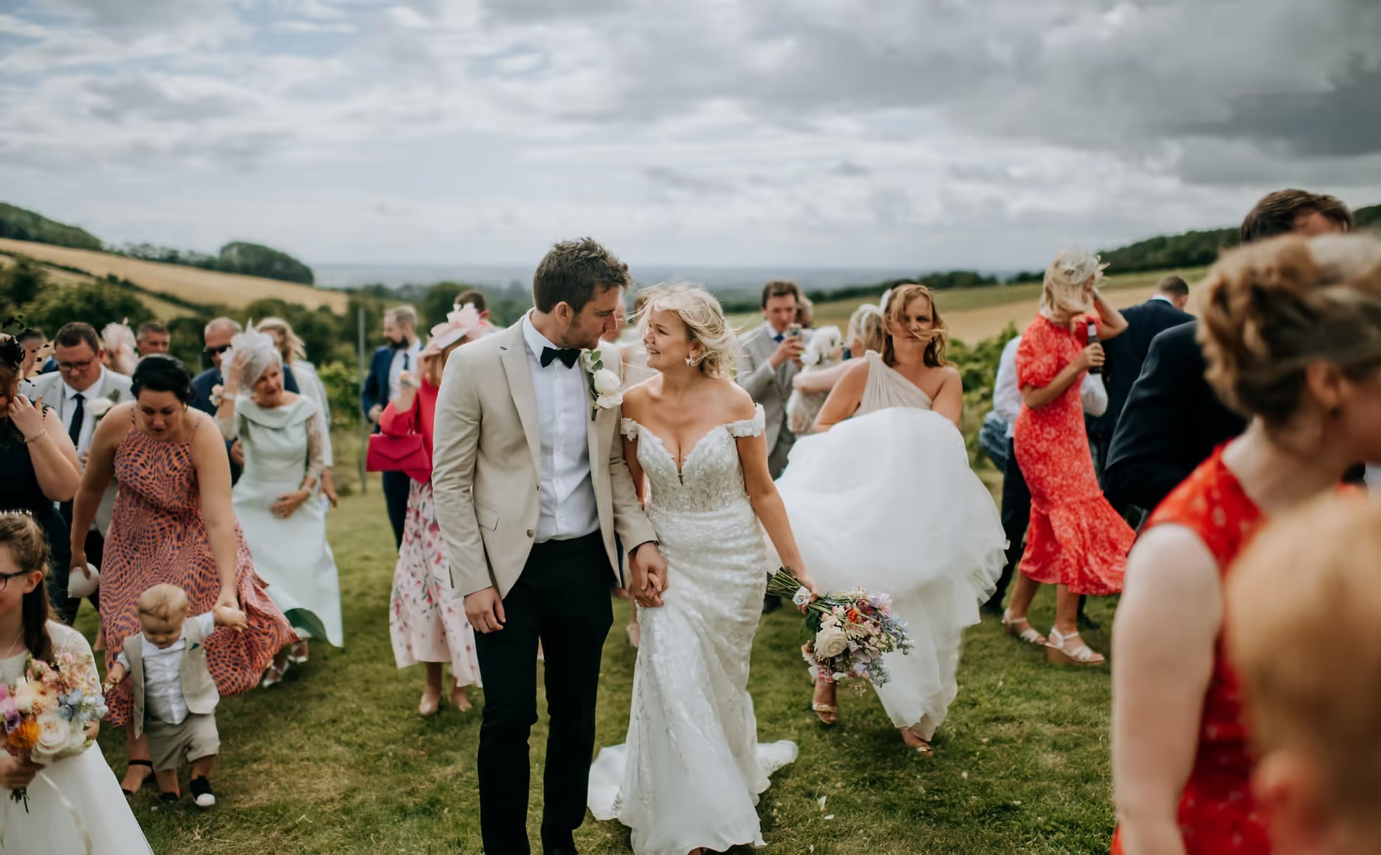 Guests celebrating outdoors at Little Wold Vineyard wedding