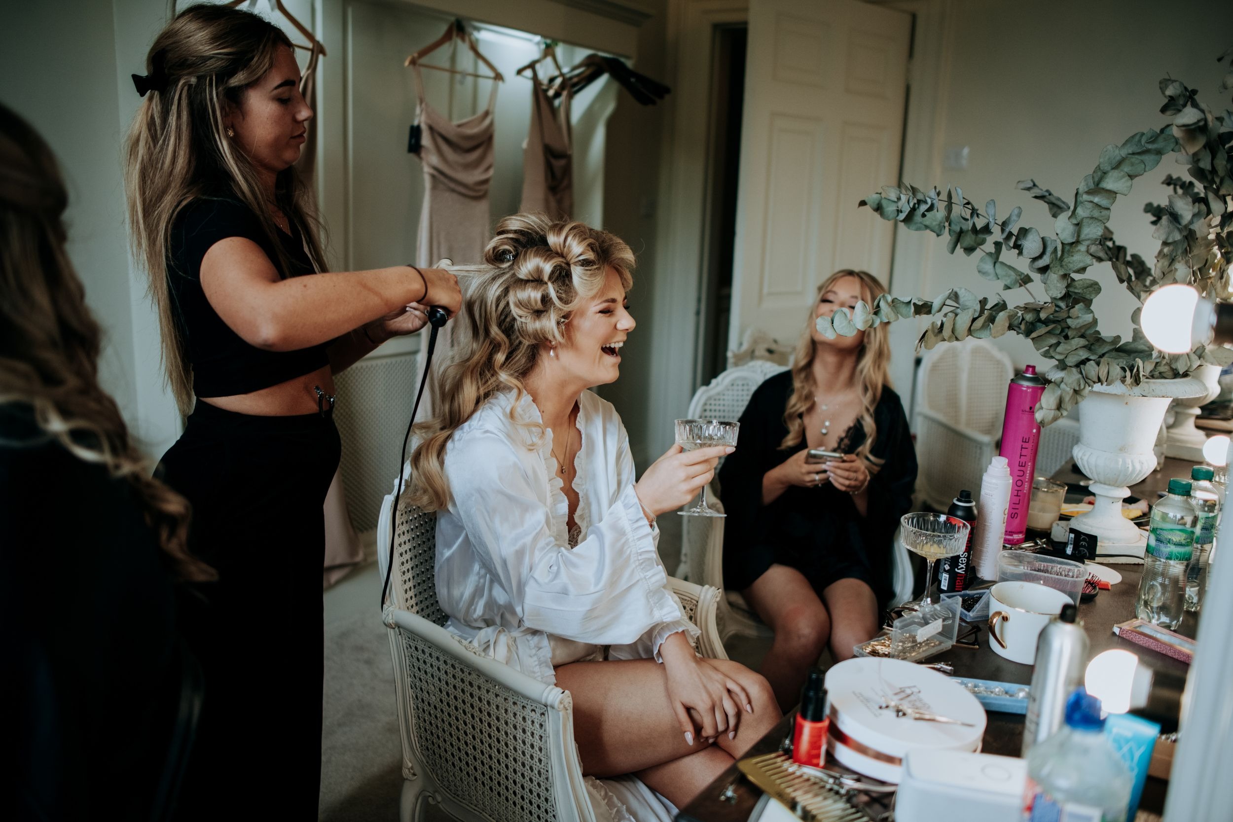 Bride getting ready during wedding morning at Wootton Hall
