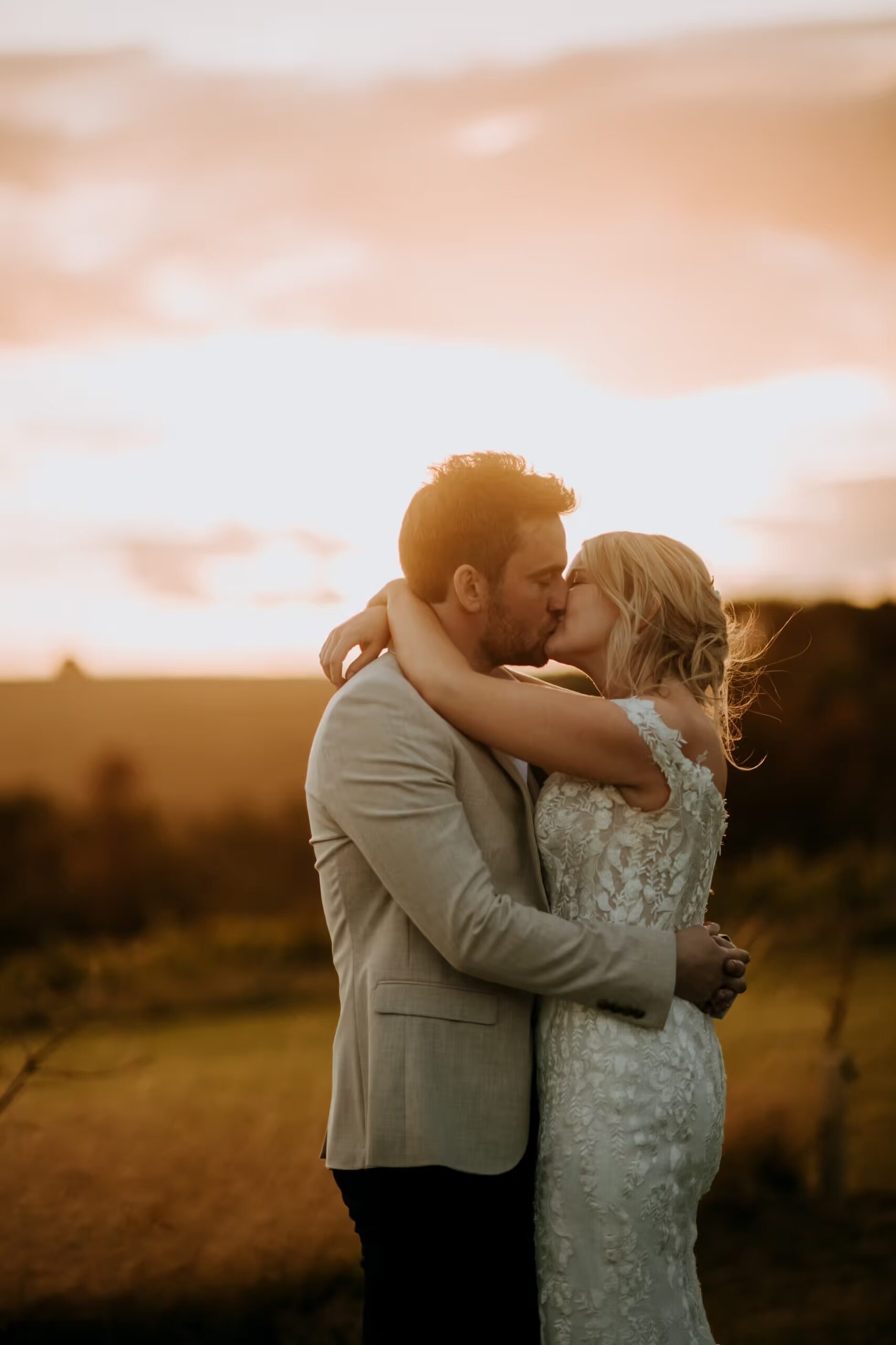 Romantic sunset portrait at Little Wold Vineyard wedding venue