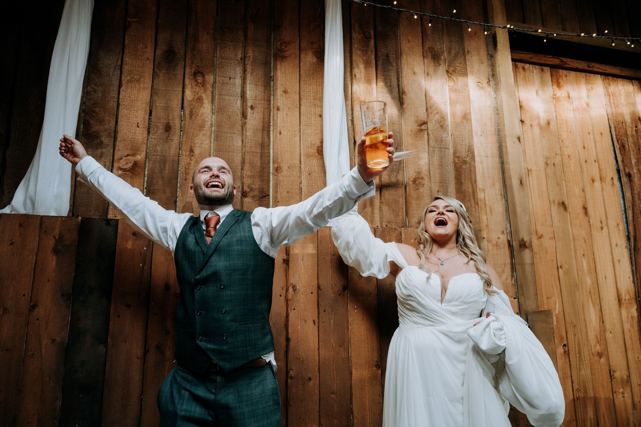 Guests celebrating during wedding reception at Riverlands venue