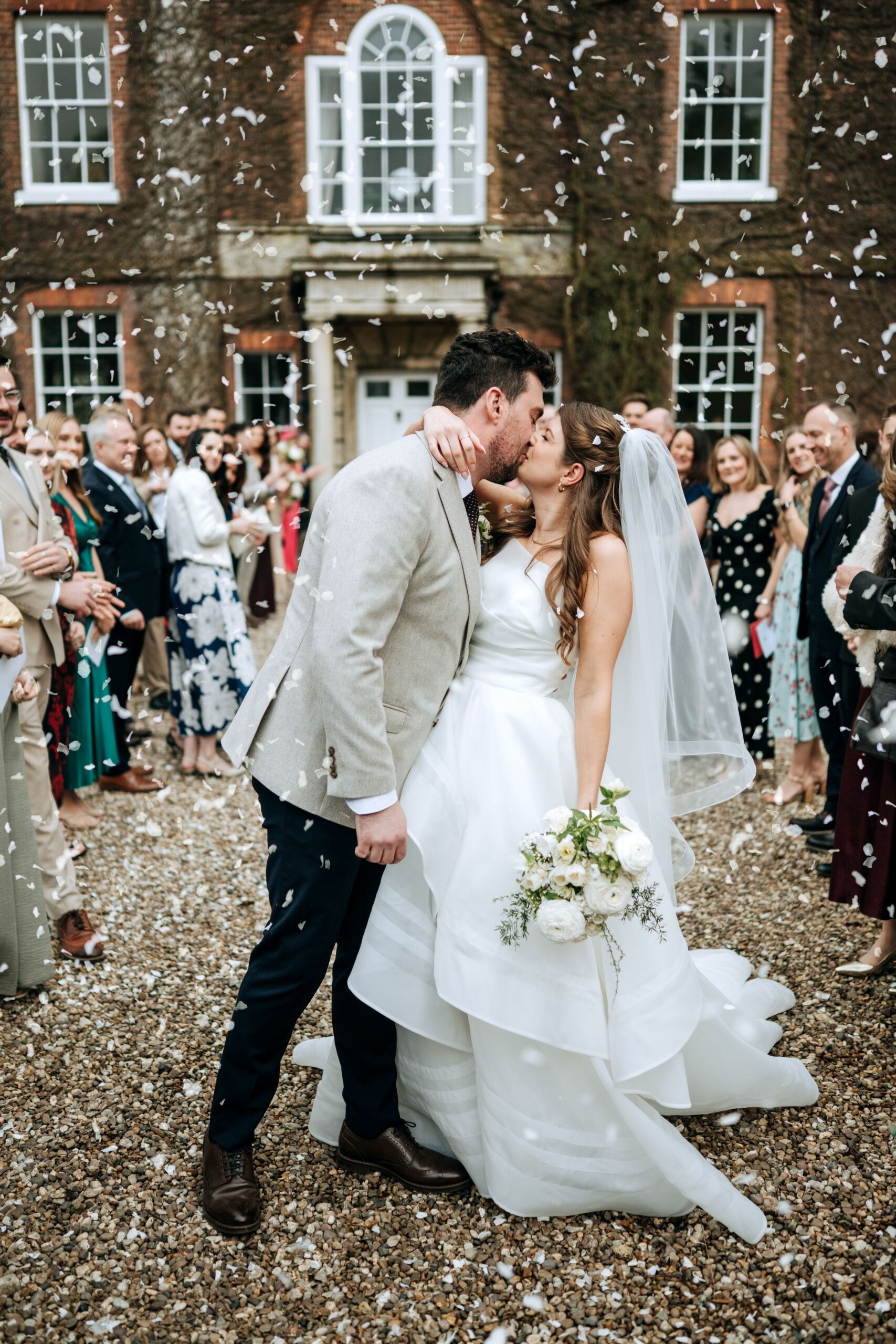 Bride and groom confetti celebration at Wootton Hall