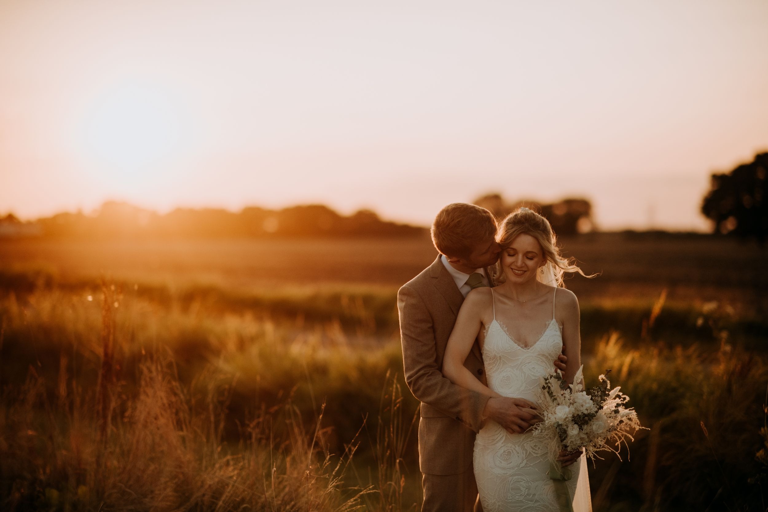 Golden hour bride and groom portrait at Riverlands