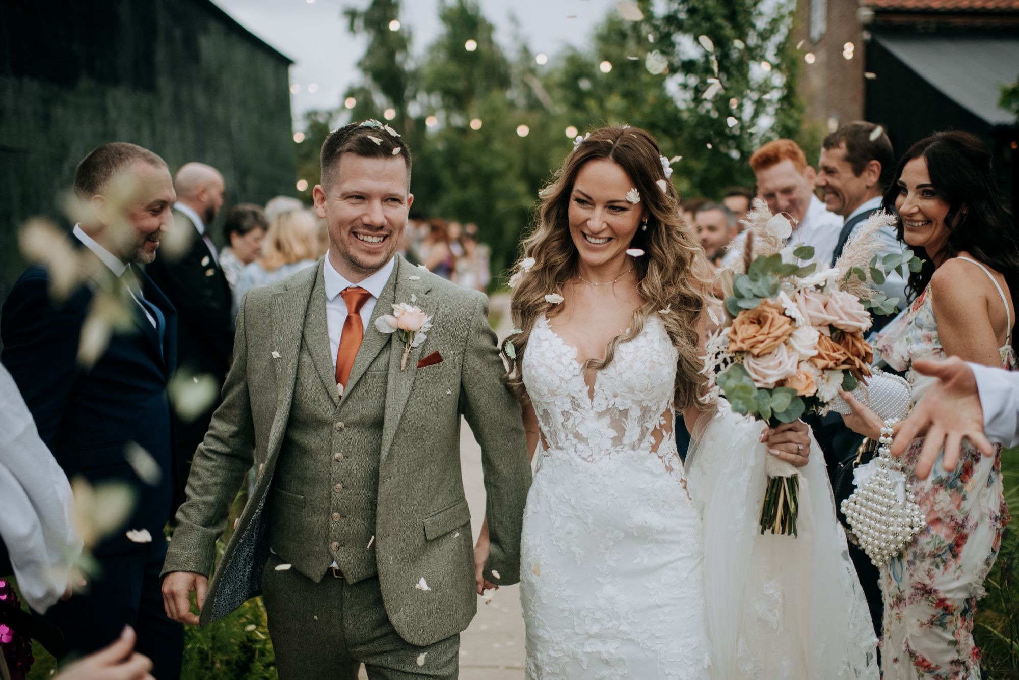 Bride and groom confetti celebration at Riverlands wedding