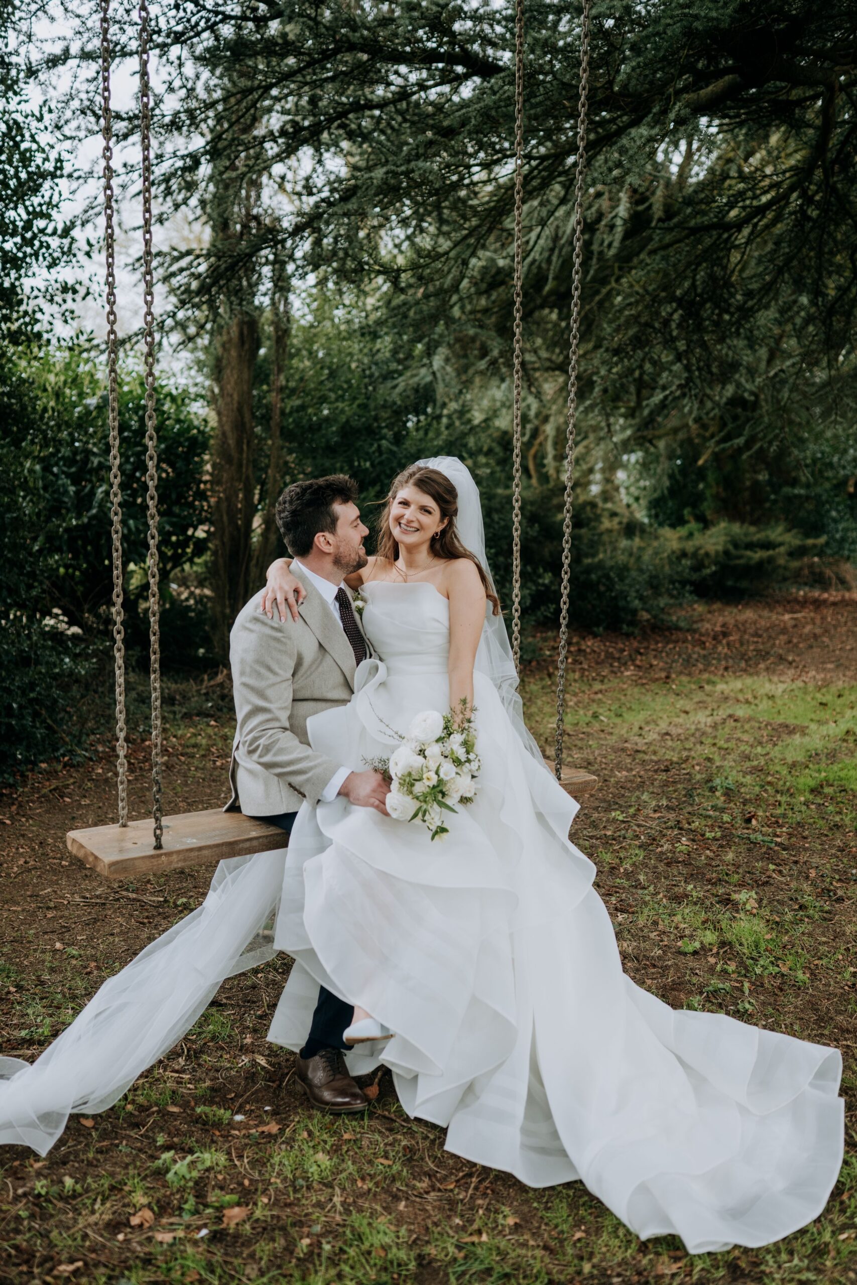 Bride and groom portrait in woodland at Wootton Hall