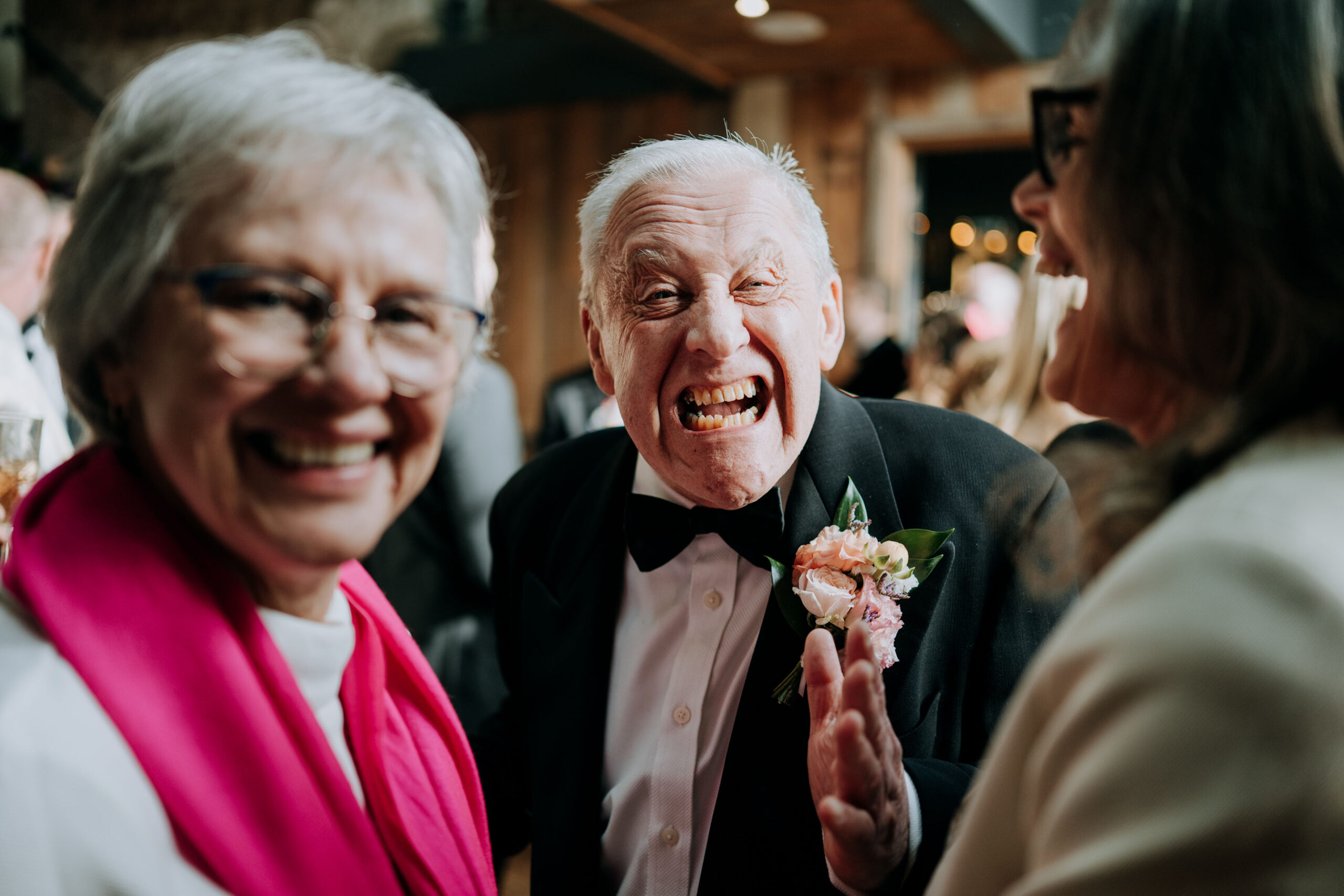 Couple enjoying speeches during their Wharfedale Grange wedding