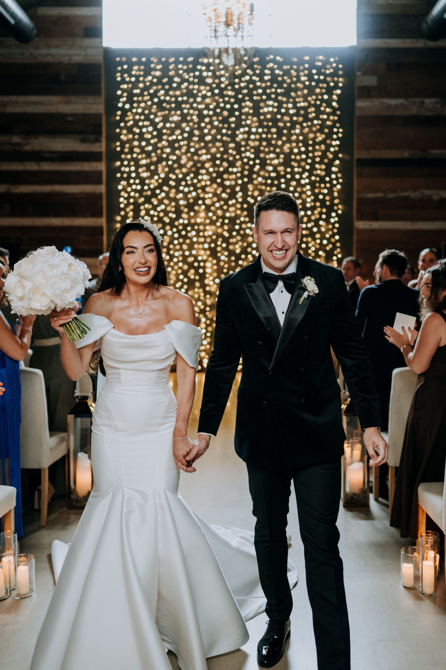 Newlyweds walking together at Wharfedale Grange