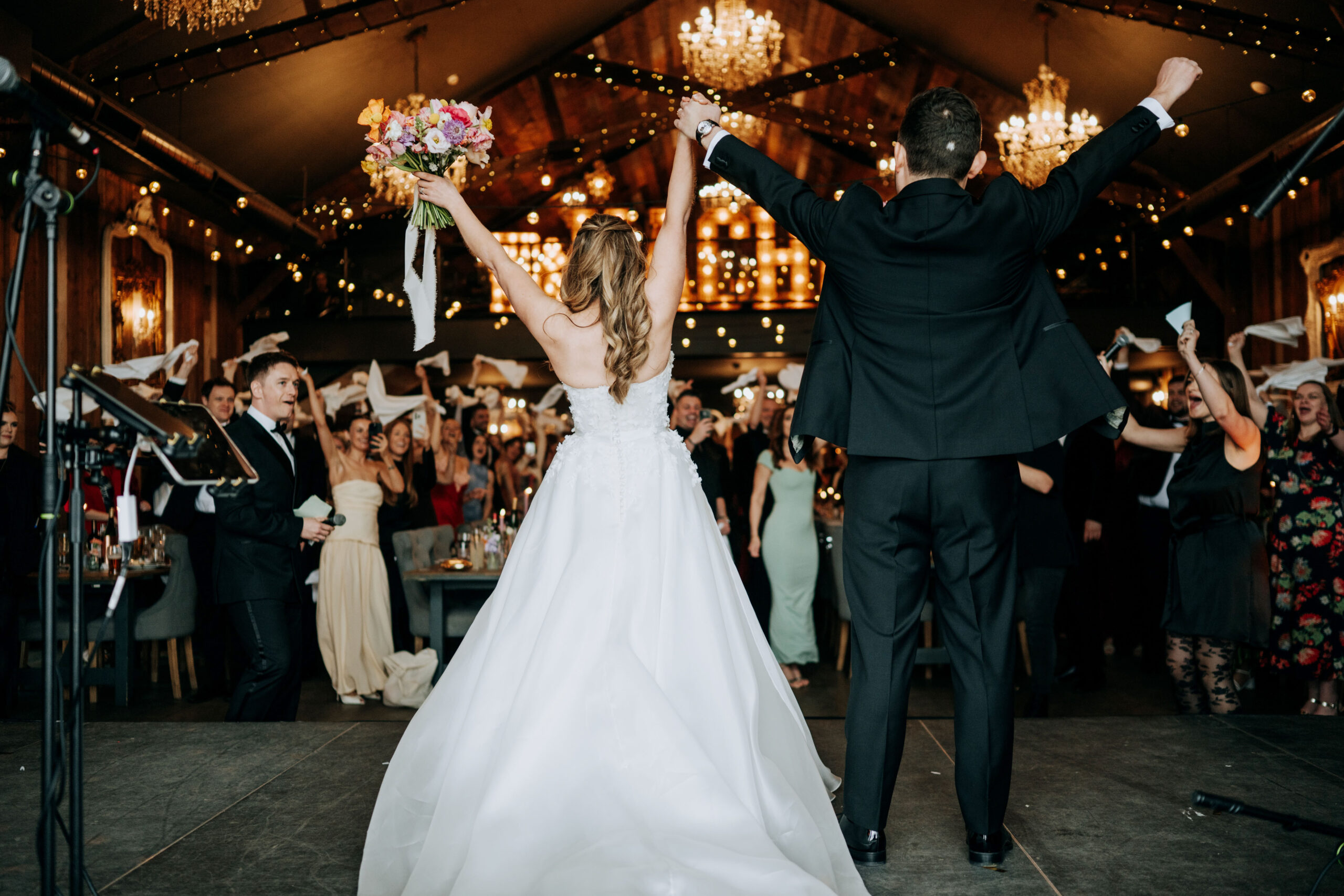Bride and groom celebrating inside Wharfedale Grange