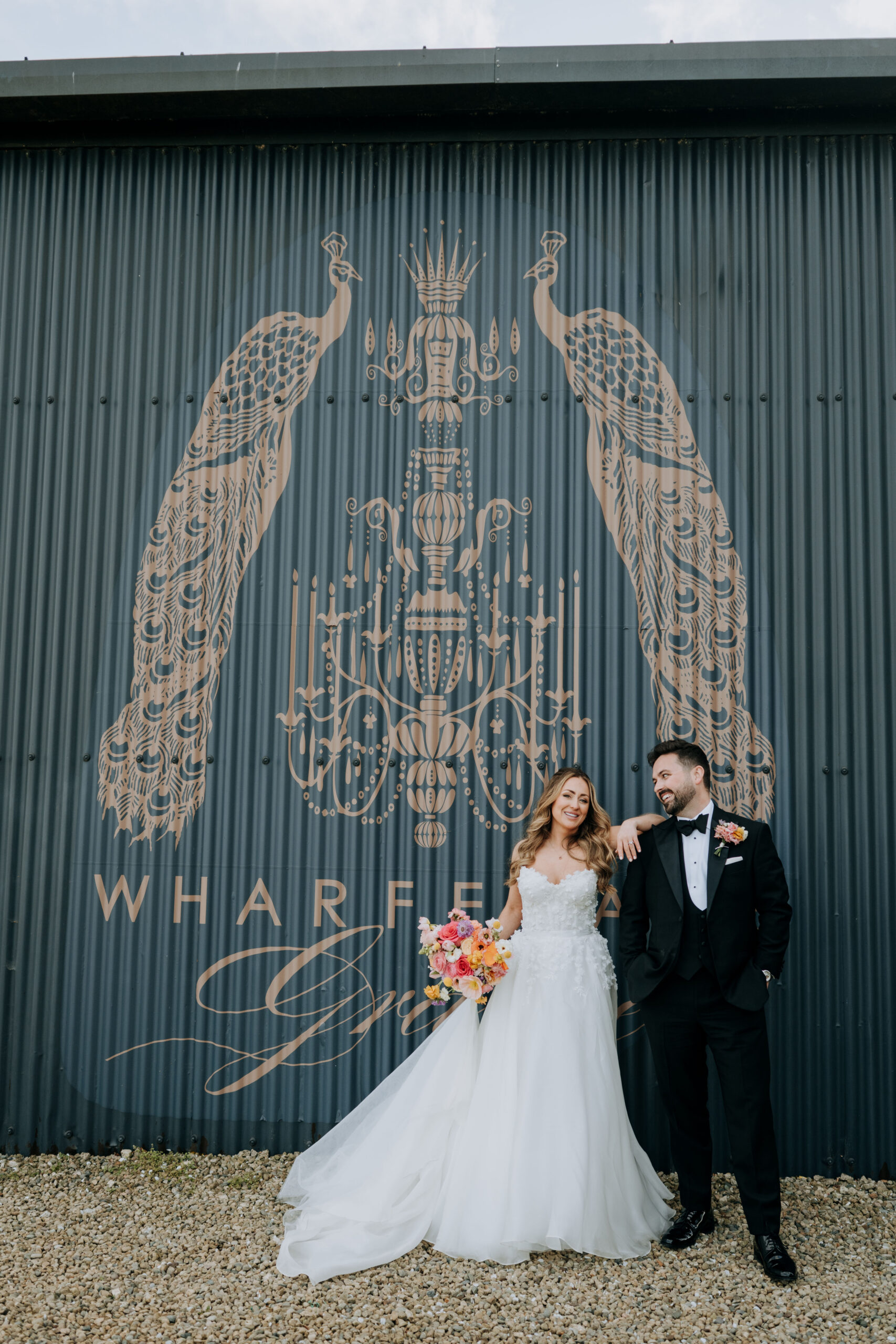 Couple beneath the iconic Wharfedale Grange mural