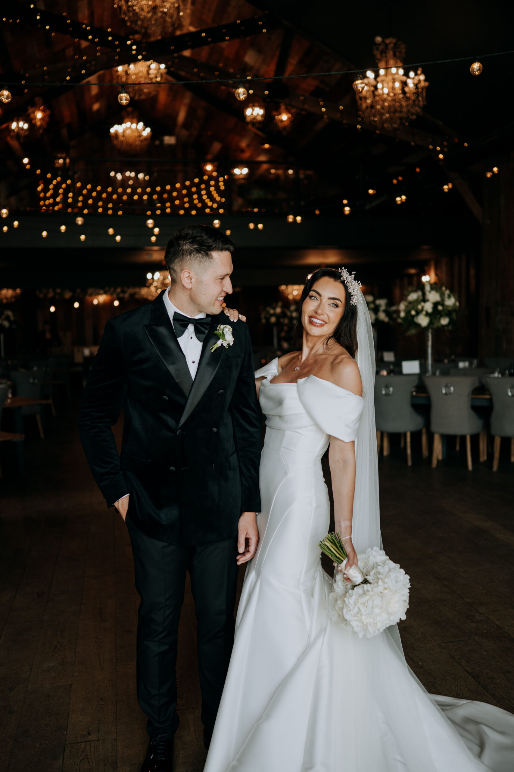 Bride and groom dancing beneath the lights at Wharfedale Grange